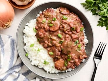 Overhead view of New Orleans-style red beans and rice on a plate.