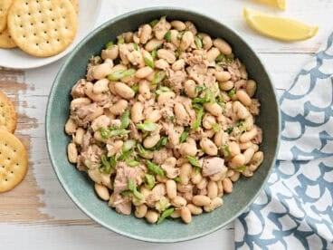 Overhead view of a bowl of tuna and white bean salad.